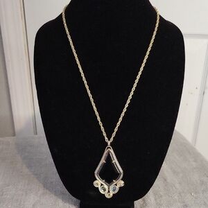Kendra Scott "Theresa" Long Gold Necklace with Black Onyx and Iridescent Stones.